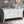 Refined Industrial 4 Door Credenza With Arc Legs & Clasps