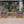 Patio Conversation Set with Foldable Acacia Wood Table and Cushioned Armchairs