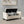 Ivory Fabric Storage Bench with Rolled Arms