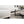 Granholm - Upholstered Curved Arm Sectional Sofa - White