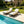 Black Iron and Teak Finish Outdoor Chaise Lounge Set