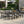 9-Piece Outdoor Dining Set with Extendable Acacia Wood Table and Cushioned Chairs