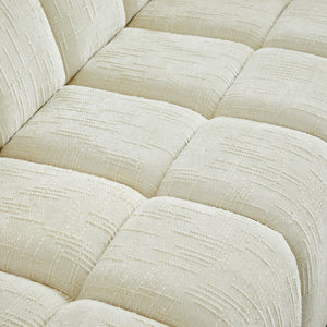 Quilted Cloud Sofa With Rounded Armrests And Piano Key Backrest Design