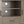 Ela - Medium TV Stand - Smoky Brown