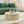 Faux Travertine Round Coffee Table with Eye-Catching Relief Design