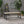 Equilibrium Outdoor Dining Table with Wooden Frame and Slat Top