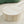 Faux Travertine Round Coffee Table with Eye-Catching Relief Design