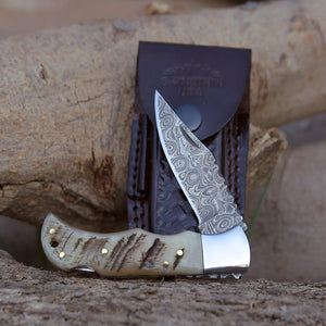Ram Damascus Pocket Knife with Exotic Ram Horn Handle & Leather Sheath - TRAPSKI
