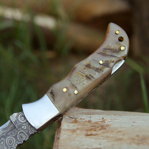 Ram Damascus Pocket Knife with Exotic Ram Horn Handle & Leather Sheath - TRAPSKI
