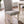 Upholstered Dining Chair with Nailhead Trim and Camel Back - Set of 2