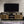 Ensata II TV Stand - Rustic Oak / Black